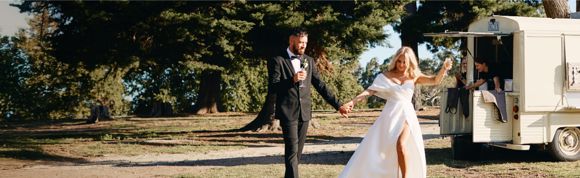 Bride and groom with food truck