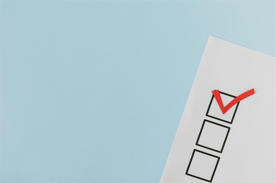photograph of three checkboxes, the first one has a tick inside