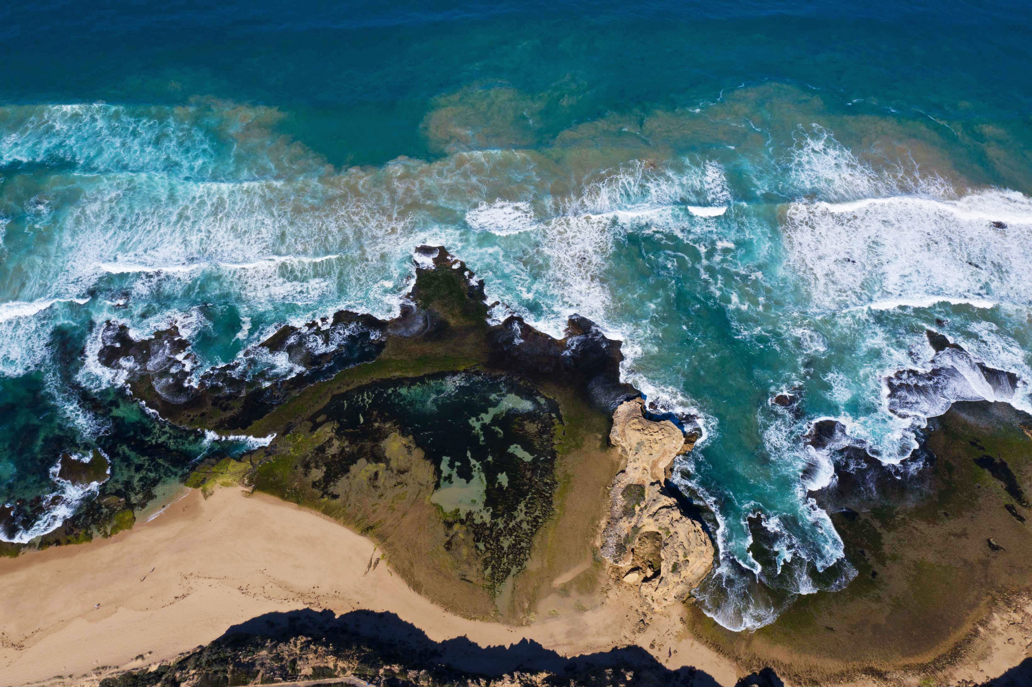 Image looking down on coast and rockpool