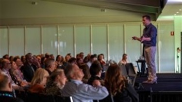 Presenter talking to the audience