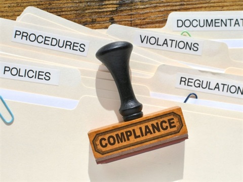 Lots of manila folders labelled regulation, violations, procedures, policies, documentation.